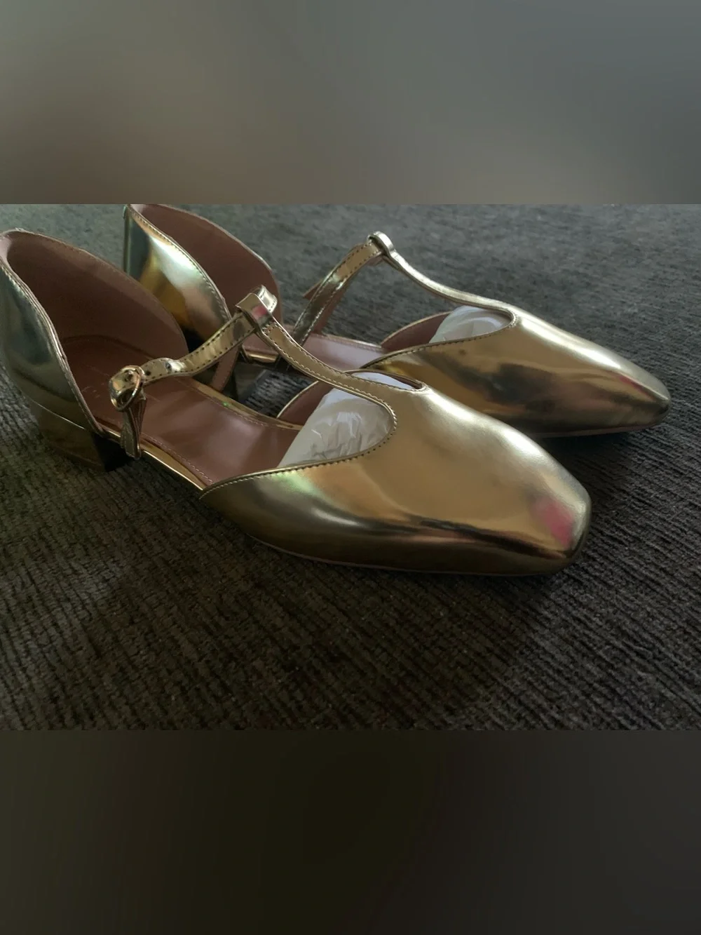 Linea Paolo Coralee Mary Jane pumps featuring a metallic gold finish.